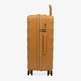 Gold Sunset Sahara medium suitcase, side view showing the side handle and reinforced corners