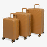 Gold Sunset Sahara suitcase set: cabin, medium and large cases standing together