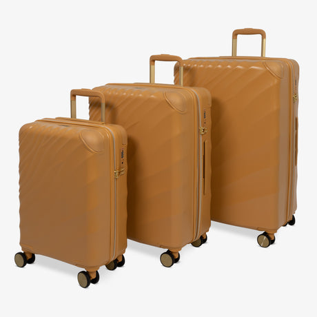 Gold Sunset Sahara suitcase set: cabin, medium and large cases standing together