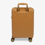 Gold Sunset Sahara cabin suitcase from the back, showing the trolley handle and back panel