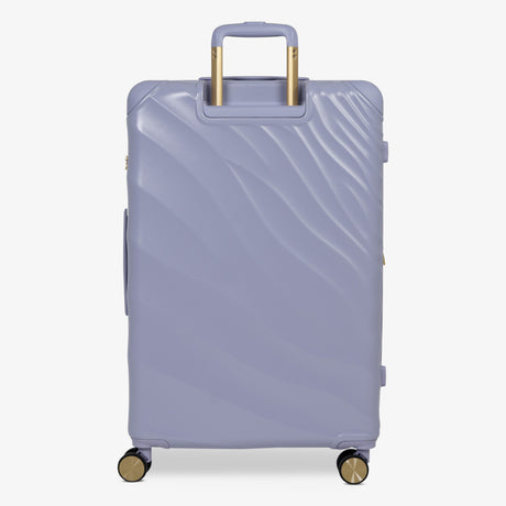 Lilac Sunrise Sahara large suitcase from the back, showing the trolley handle and back panel