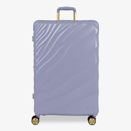 Lilac Sunrise Sahara large suitcase with a wave-design hard shell and 8 double spinner wheels