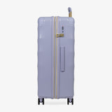 Lilac Sunrise Sahara large suitcase, side view showing the side handle and reinforced corners