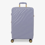 Lilac Sunrise Sahara medium suitcase with a wave-design hard shell and 8 double spinner wheels