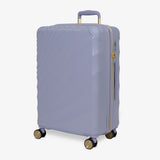 Lilac Sunrise Sahara medium suitcase, angled view showing the wave-design shell