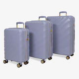 Lilac Sunrise Sahara suitcase set: cabin, medium and large cases standing together