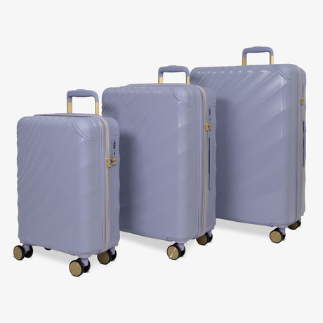 Lilac Sunrise Sahara suitcase set: cabin, medium and large cases standing together