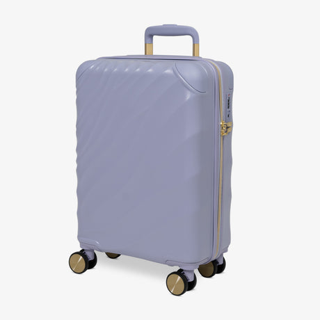 Lilac Sunrise Sahara cabin suitcase, angled view showing the wave-design shell