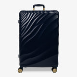 Midnight Navy Sahara large suitcase with a wave-design hard shell and 8 double spinner wheels