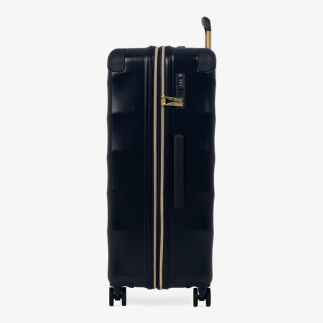 Midnight Navy Sahara large suitcase, side view showing the side handle and reinforced corners
