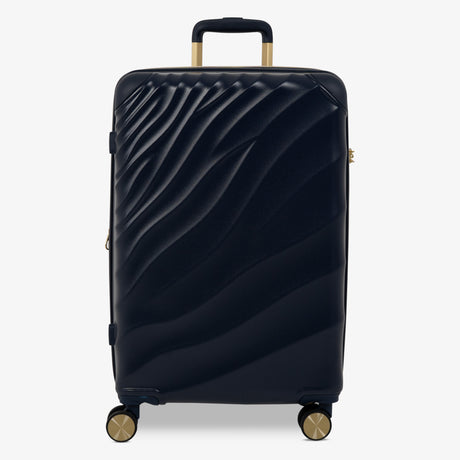 Midnight Navy Sahara medium suitcase with a wave-design hard shell and 8 double spinner wheels