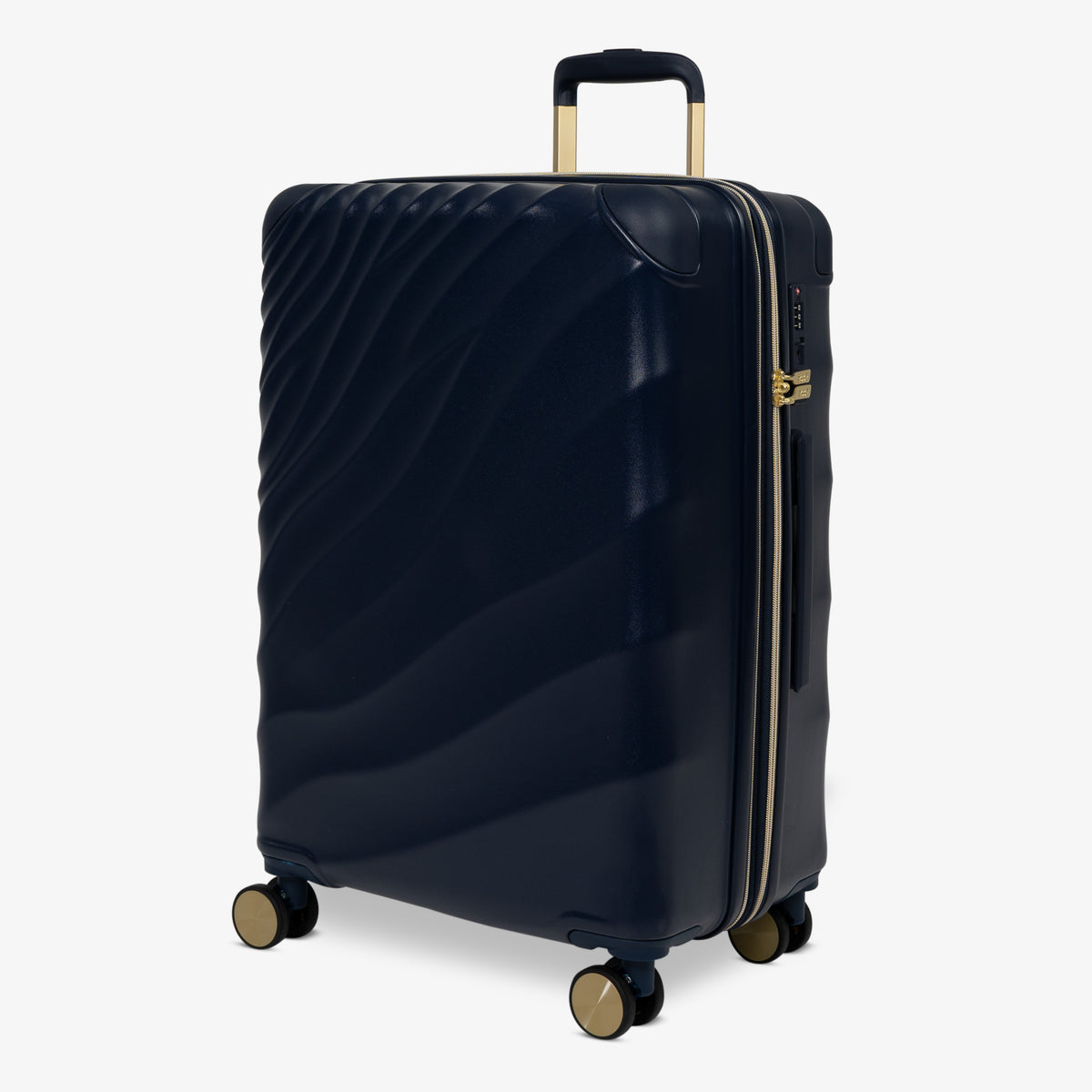 Midnight Navy Sahara medium suitcase, angled view showing the wave-design shell