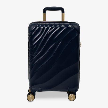Midnight Navy Sahara cabin suitcase with a wave-design hard shell and 8 double spinner wheels