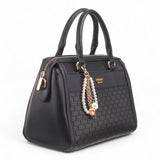 Bag Shack black faux leather handbag with woven front panel, gold hardware, and decorative pearl and flower charm.