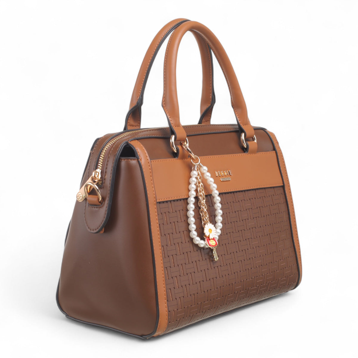 Bag Shack Bessie coffee brown faux leather handbag with woven front panel, gold hardware, and pearl charm detail.