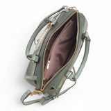 Bag Shack green multi-compartment handbag with woven panel, gold hardware, and pearl detail on the handle