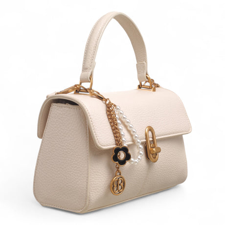 Bag Shack | Luggage, Bags, Handbags & Travel Accessories beige faux leather handbag with gold lock and pearl charm