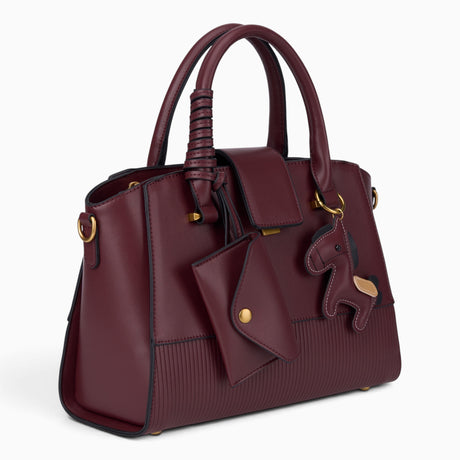 Wine ribbed panel tote bag, angled view showing the ribbed panel and horse charm