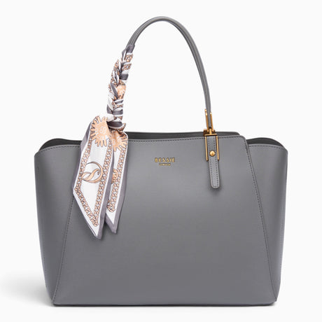 Grey faux leather tote bag with a patterned scarf tied to the handle