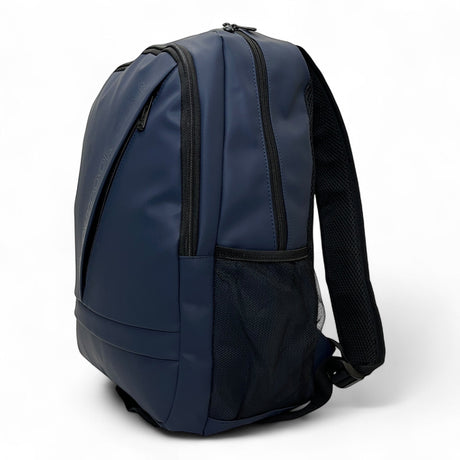 Navy Bag Shack rubber-coated 27L laptop backpack with diagonal zip pocket, mesh side pockets, and padded straps.
